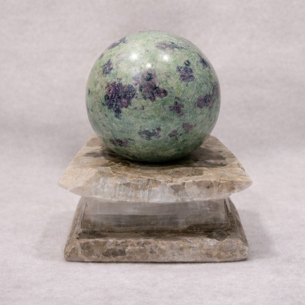 ruby zoisite sphere for vitality motivation and balance