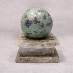 ruby zoisite sphere for vitality motivation and balance