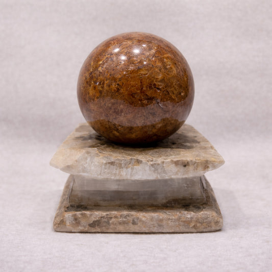 petrified wood sphere for grounding patience and stability