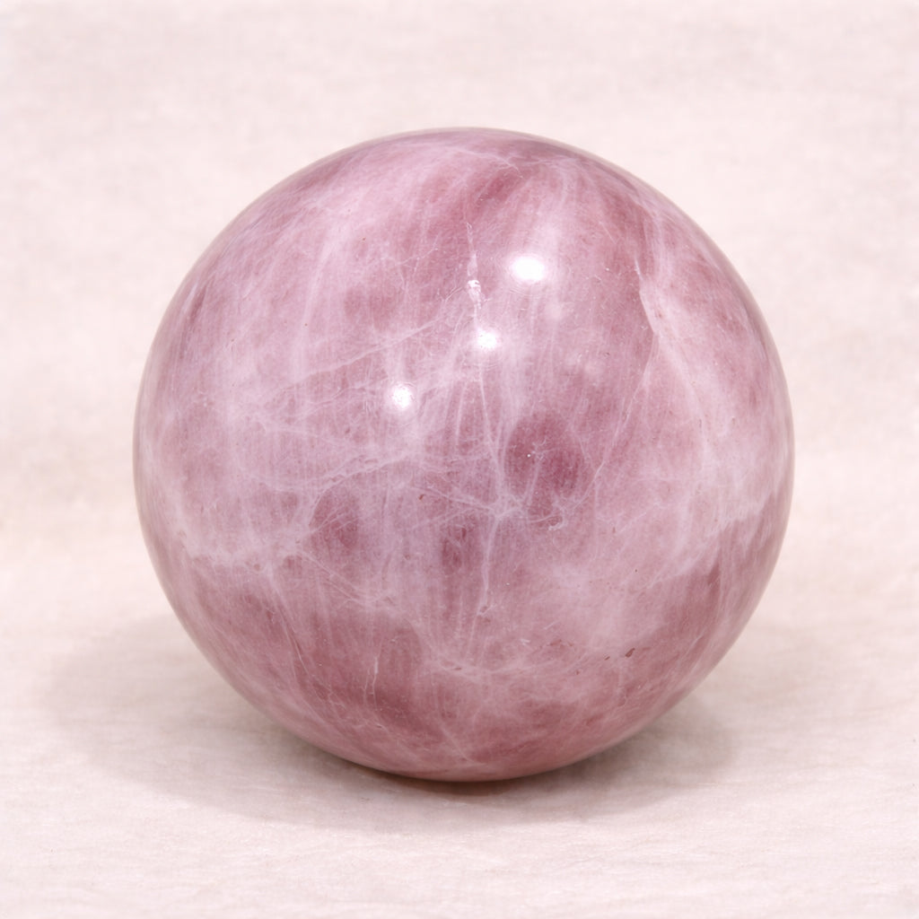 rose quartz sphere for self love harmony and peace
