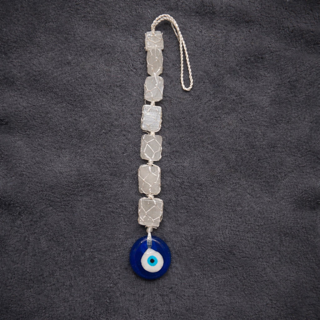 selenite evil eye hanging for cleansing and protection